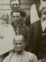 Record image of Dora Ellen Sutton-McKee (holding child) (born Dennis)